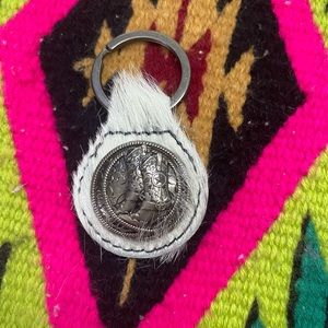 White cowhide, cowboy boots, silver keychain, brand new